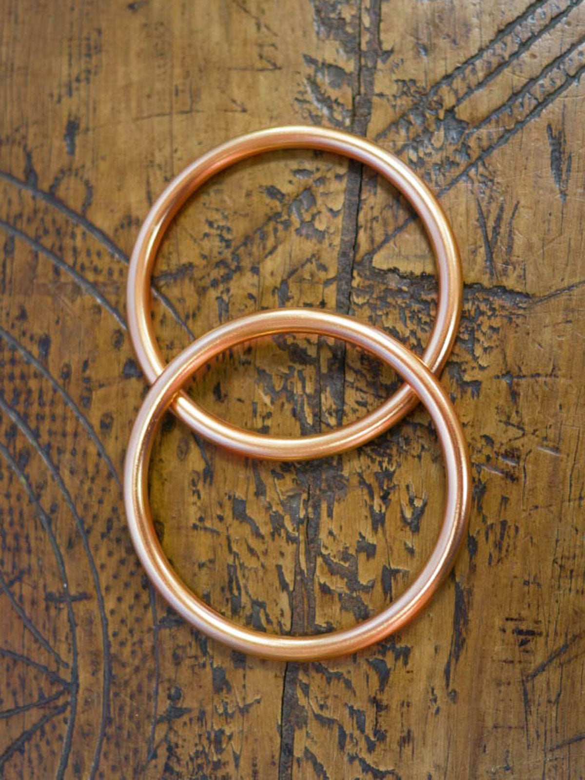Roségoldene Sling-Ringe