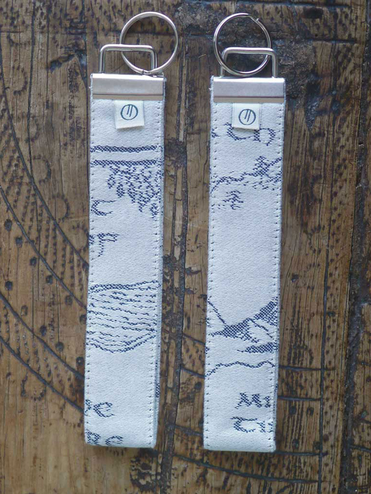 Schlüsselanhänger „Realm of Middle-earth“ aus Jacquard mit Tinte