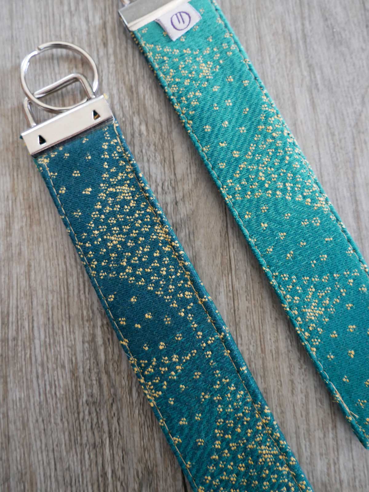 Sternennacht-Schlüsselanhänger aus Jacquard mit Goldstaub